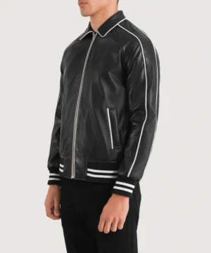 Premium Cooper black varsity jacket featuring smooth leather texture, refined detailing, and timeless varsity-style silhouette.