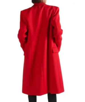 Emily in Paris S05 red coat worn by Lily Collins with modern structure, luxurious fabric and standout Parisian style aesthetics