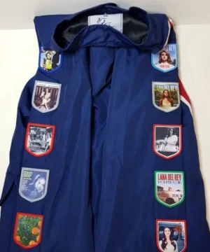 Blue racing jacket inspired by Lana Del Rey with modern silhouette, bold color accents, and contemporary urban fashion style