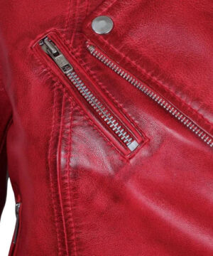 Red women’s asymmetrical motorcycle leather jacket with angled zip closure and modern moto-inspired look