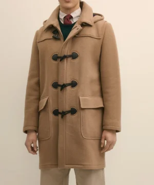 Mikey Day tan coat from SNL Season 51 with elegant silhouette, durable construction, and modern stage fashion appeal