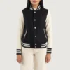 Black & white Savant varsity jacket with hybrid fabric construction, rib-knit trims, and structured collegiate styling