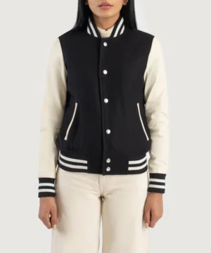 Black & white Savant varsity jacket with hybrid fabric construction, rib-knit trims, and structured collegiate styling