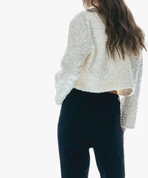 Premium black sequin bow top designed for TV-inspired fashion and celebrity style