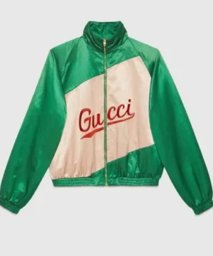 Green satin Gucci jacket worn by BTS Jimin in Dynamite, highlighting luxurious finish and contemporary streetwear appeal
