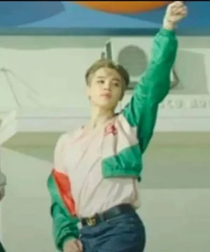 Jimin BTS Dynamite Gucci green satin jacket with smooth texture, elegant tailoring, and standout celebrity fashion look