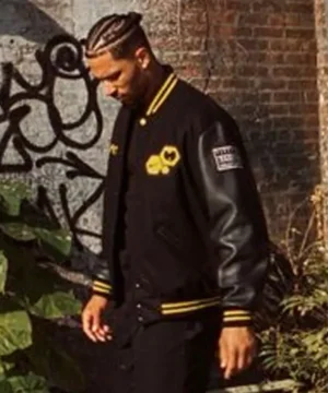 Hart black varsity jacket inspired by Wu-Tang style with snap-button closure and clean collegiate aesthetics
