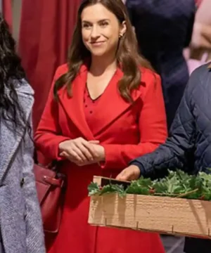 Lacey Chabert red coat from A Merry Scottish Christmas 2023 with tailored fit and festive winter look