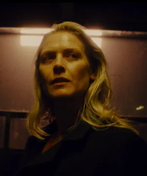 Cecilia Pederson Saw X 2023 black coat featuring a dark, sleek design and cinematic horror film-inspired style