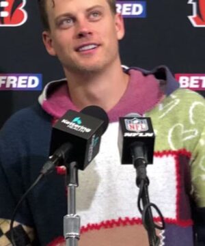 NFL star Joe Burrow post-game color-block hoodie, modern athlete street style