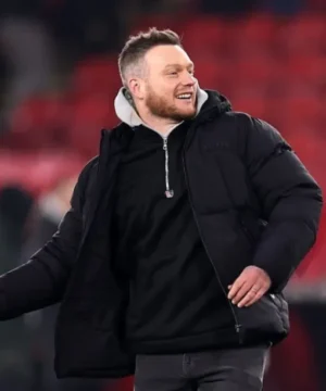 Sky Bet Championship Kim Hellberg puffer jacket with quilted padding, high-neck collar, and winter matchday look