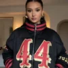 Kristin Juszczyk SF 49ers black puffer jacket featuring official NFL team design and premium winter outerwear
