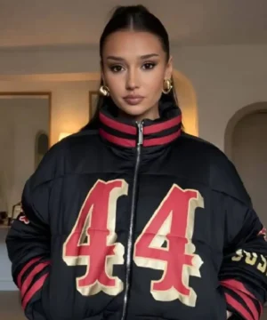 Kristin Juszczyk SF 49ers black puffer jacket featuring official NFL team design and premium winter outerwear