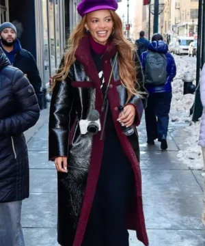 Leslie Grace NYC black leather coat featuring sleek celebrity-inspired design and premium outerwear styling