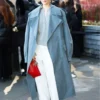 Louisa Jacobson Calvin Klein fashion show coat featuring minimalist tailoring and modern runway elegance