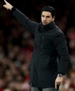 Mikel Arteta black puffer jacket from Arsenal vs Wigan Athletic match with quilted padding and sporty fit