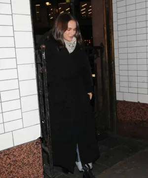 Natalie Portman London 2026 black coat featuring elegant celebrity-inspired red carpet style and tailored fit