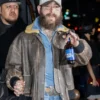 Post Malone NY Fashion Week distressed leather jacket featuring edgy street style and celebrity-inspired fashion