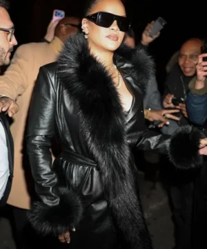 Rihanna New York City black leather coat with plush fur trim collar and high-fashion outerwear appeal