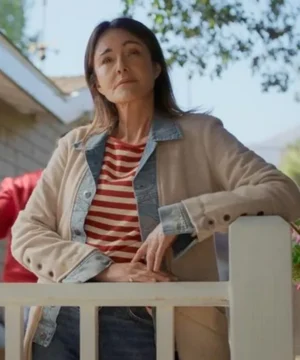 Christa Miller Shrinking Season 3 long coat featuring a sleek tailored silhouette with elegant modern outerwear styling