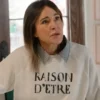 Christa Miller Raison D’etre sweatshirt from Shrinking Season 3, stylish TV show inspired fashion