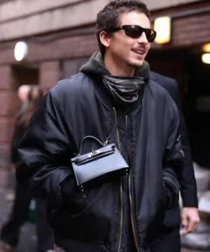 Marty Supreme Q&A Timothée Chalamet black bomber jacket with minimalist design and modern fashion appeal