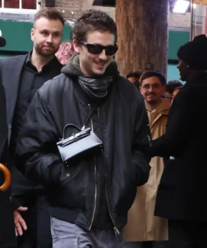 Celebrity-style Timothée Chalamet black bomber jacket showcasing clean lines and contemporary urban outerwear