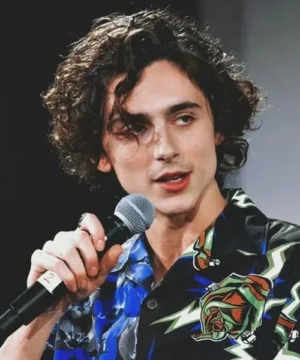 Timothée Chalamet color block blue black shirt modern men’s trendy top