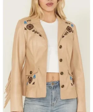 Women’s tan leather jacket with embroidered designs and stylish fringe detailing for premium casual outerwear