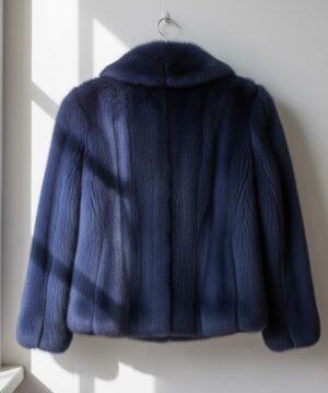 Short midnight blue faux fur jacket offering a chic look, cozy feel, and upscale outerwear fashion